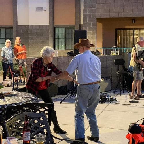 Photo of seniors dancing at a party at Fellowship Square Independent Living in Surprise