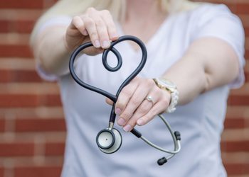 Photo of a home health nurse with a stethoscope